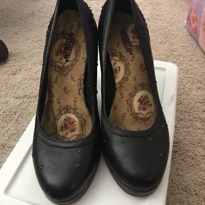 Black leather studded Seychelles high heeled pumps